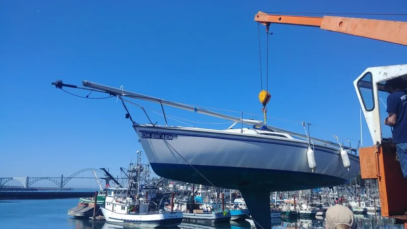 Fulmar lifted in a marina hoist